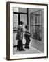 French Actor Jacques Tati Looking at the Names of a Building-Yale Joel-Framed Premium Photographic Print