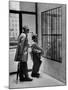 French Actor Jacques Tati Looking at the Names of a Building-Yale Joel-Mounted Premium Photographic Print