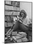 French Actress Barbara Laage, Alone in Her Apartment Reading-Nina Leen-Mounted Photographic Print