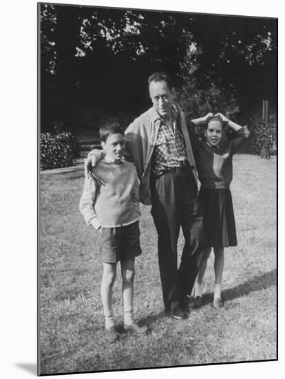 French Author Albert Camus Poised Standing on Lawn, Arms around His Twins Jean and Catherine-Loomis Dean-Mounted Premium Photographic Print