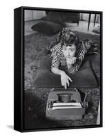 French Authoress Francoise Sagan, Laying on the Floor Typing-Thomas D^ Mcavoy-Framed Stretched Canvas