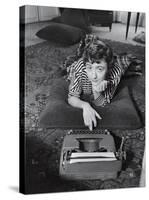 French Authoress Francoise Sagan, Laying on the Floor Typing-Thomas D^ Mcavoy-Stretched Canvas