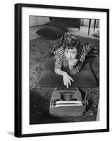 French Authoress Francoise Sagan, Laying on the Floor Typing-Thomas D^ Mcavoy-Framed Premium Photographic Print