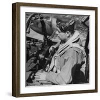 French Aviator/Author Antoine de Saint Exupery Sitting in Cockpit of Fighter Plane-John Phillips-Framed Premium Photographic Print