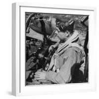 French Aviator/Author Antoine de Saint Exupery Sitting in Cockpit of Fighter Plane-John Phillips-Framed Premium Photographic Print