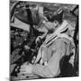 French Aviator/Author Antoine de Saint Exupery Sitting in Cockpit of Fighter Plane-John Phillips-Mounted Premium Photographic Print