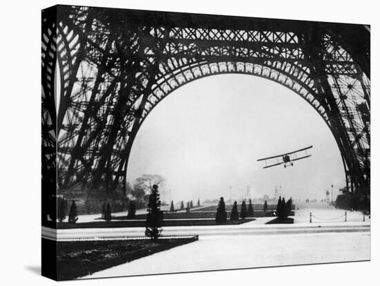 French Aviator Lieutenant Collot Successfully Flies His Biplane Beneath the Tour Eiffel-null-Stretched Canvas