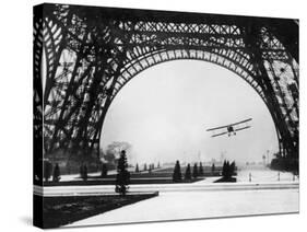 French Aviator Lieutenant Collot Successfully Flies His Biplane Beneath the Tour Eiffel-null-Stretched Canvas