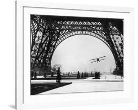 French Aviator Lieutenant Collot Successfully Flies His Biplane Beneath the Tour Eiffel-null-Framed Photographic Print