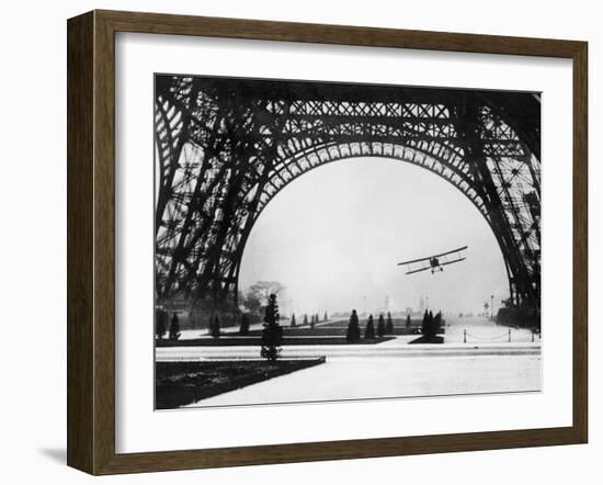 French Aviator Lieutenant Collot Successfully Flies His Biplane Beneath the Tour Eiffel-null-Framed Photographic Print