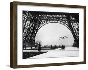 French Aviator Lieutenant Collot Successfully Flies His Biplane Beneath the Tour Eiffel-null-Framed Photographic Print