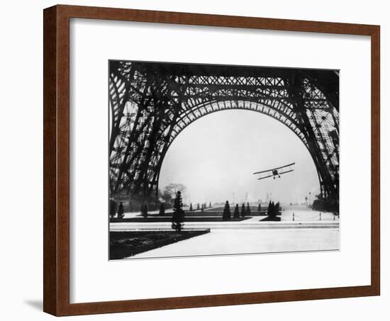 French Aviator Lieutenant Collot Successfully Flies His Biplane Beneath the Tour Eiffel-null-Framed Photographic Print