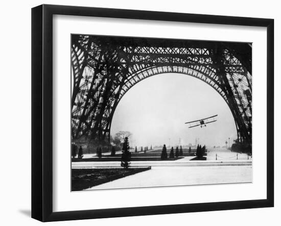 French Aviator Lieutenant Collot Successfully Flies His Biplane Beneath the Tour Eiffel-null-Framed Photographic Print