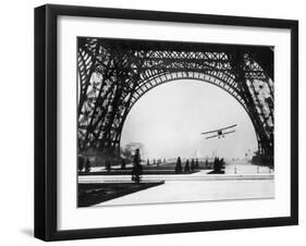 French Aviator Lieutenant Collot Successfully Flies His Biplane Beneath the Tour Eiffel-null-Framed Photographic Print