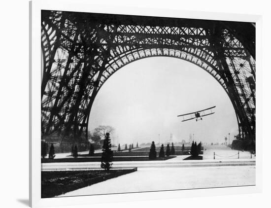 French Aviator Lieutenant Collot Successfully Flies His Biplane Beneath the Tour Eiffel-null-Framed Photographic Print