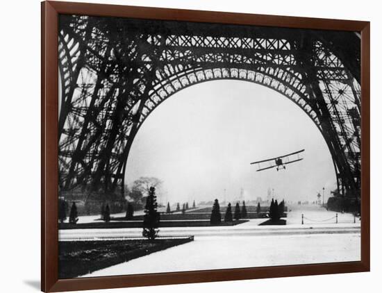 French Aviator Lieutenant Collot Successfully Flies His Biplane Beneath the Tour Eiffel-null-Framed Photographic Print