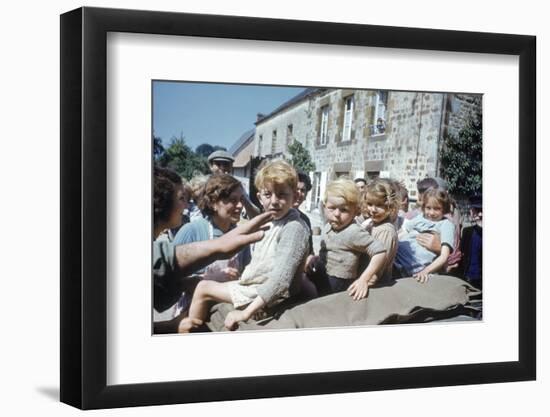 French Children in the Town of Avranches Sitting on Us Military Jeep, Normandy, France, 1944-Frank Scherschel-Framed Photographic Print