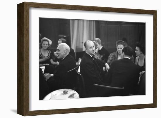 French Designer Christian Dior Drinking with Unidentified Others at a Bar, Paris, November 1947-Frank Scherschel-Framed Photographic Print