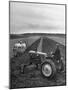 French Farmer Georges Raoul Fremond Trying Out His New Massey-Harris Tractor Obtained Through Eca-null-Mounted Photographic Print