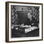 French Journalist Fernand De Brinon Sitting at His Desk-null-Framed Photographic Print