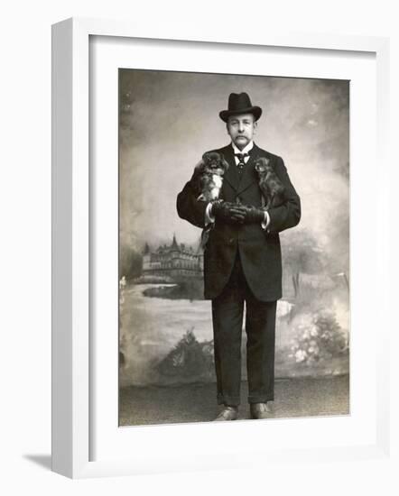 French Man in a Black Suit with a Pekingese Dog Under Each Arm-null-Framed Photographic Print