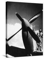 French Pilot on a Fighter Plane-null-Stretched Canvas