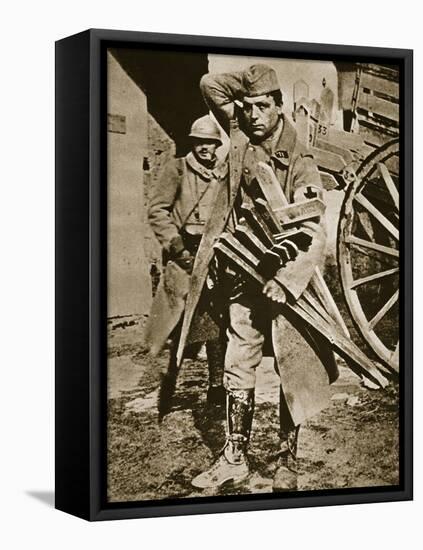 French soldier with wooden crosses to be placed on temporary graves, World War I, c1914-c1918-Unknown-Framed Stretched Canvas