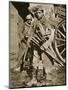 French soldier with wooden crosses to be placed on temporary graves, World War I, c1914-c1918-Unknown-Mounted Photographic Print