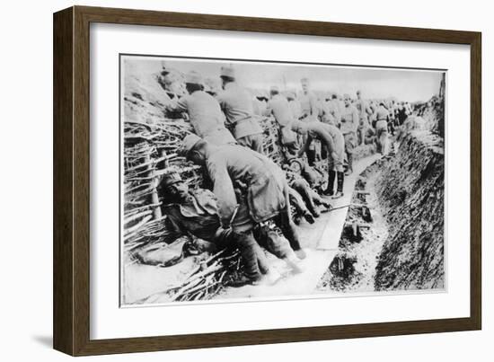 French Soldiers Tend to Their Wounded Men During Trench Warfare on the Western Front-null-Framed Art Print