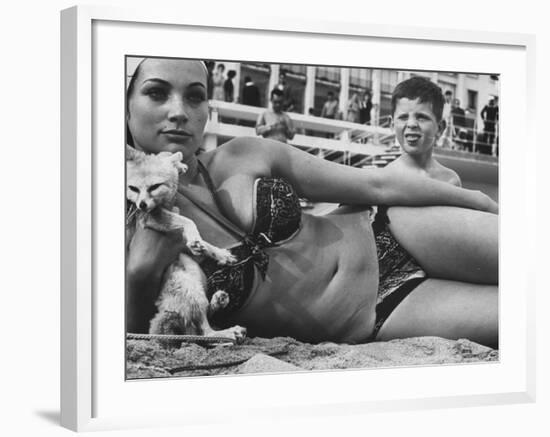 French Starlet Philomene Toulouse Angling Attention with Pet Fox and Bare Torso-Paul Schutzer-Framed Premium Photographic Print