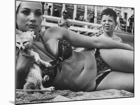 French Starlet Philomene Toulouse Angling Attention with Pet Fox and Bare Torso-Paul Schutzer-Mounted Premium Photographic Print