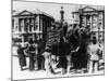 French Street Sellers Offering Souvenirs to a Truckload of German Soldiers, Paris, 27 July 1940-null-Mounted Photographic Print