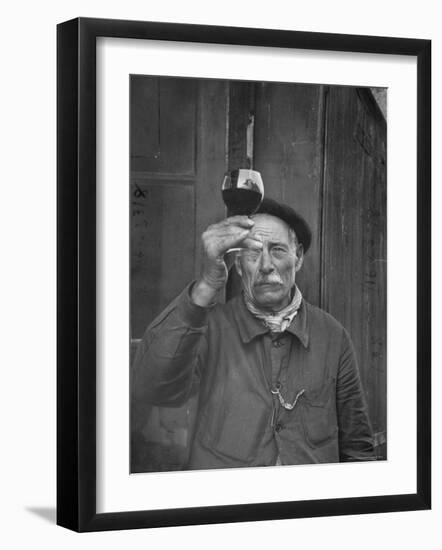 French Vintner Showing the Proper Wine Tasting Technique-Thomas D^ Mcavoy-Framed Premium Photographic Print