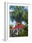 French West Indies, St-Barthelemy. Gustavia, harborside building with palm tree-Walter Bibikow-Framed Photographic Print