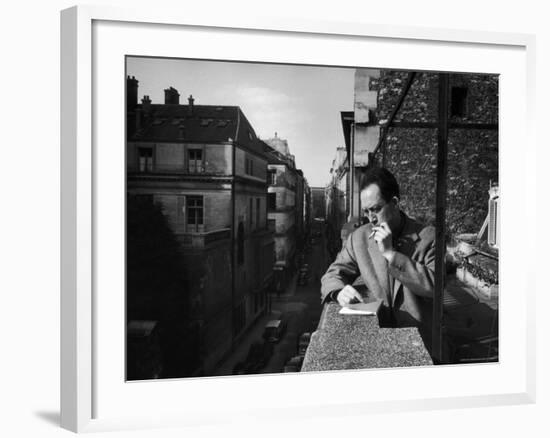 French Writer Albert Camus Smoking Cigarette on Balcony Outside His Publishing Firm Office-Loomis Dean-Framed Premium Photographic Print