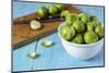 Fresh Brussels Sprouts in White Bowl on Turquoise Wooden Table-Jana Ihle-Mounted Photographic Print