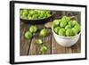 Fresh Brussels Sprouts in White Bowl on Wooden Table-Jana Ihle-Framed Photographic Print