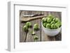 Fresh Brussels Sprouts in White Bowl on Wooden Table-Jana Ihle-Framed Photographic Print