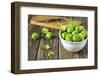 Fresh Brussels Sprouts in White Bowl on Wooden Table-Jana Ihle-Framed Photographic Print