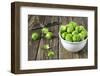 Fresh Brussels Sprouts in White on Wooden Table-Jana Ihle-Framed Photographic Print