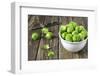 Fresh Brussels Sprouts in White on Wooden Table-Jana Ihle-Framed Photographic Print