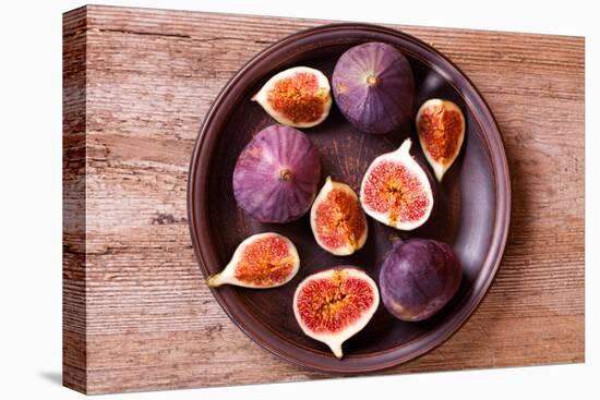 Fresh Figs in a Plate on Rustic Wooden Table-Marylooo-Stretched Canvas