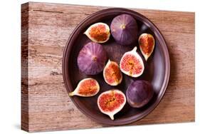 Fresh Figs in a Plate on Rustic Wooden Table-Marylooo-Stretched Canvas