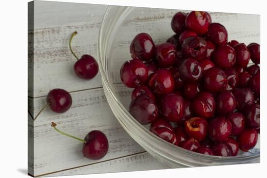 Fresh, Pitted Red Cherries in a Glass Bowl-Cynthia Classen-Stretched Canvas