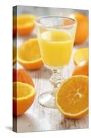 Fresh Pressed Orange Juice and Oranges-Jana Ihle-Stretched Canvas