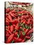 Fresh Red Chili Peppers in Baskets-Joerg Lehmann-Stretched Canvas