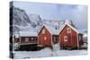 Fresh Snow Covering the Typical Norwegian Homes, the Rorbu, in the Lofoten Islands, Arctic, Norway-Roberto Moiola-Stretched Canvas