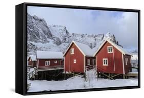 Fresh Snow Covering the Typical Norwegian Homes, the Rorbu, in the Lofoten Islands, Arctic, Norway-Roberto Moiola-Framed Stretched Canvas