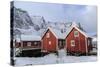 Fresh Snow Covering the Typical Norwegian Homes, the Rorbu, in the Lofoten Islands, Arctic, Norway-Roberto Moiola-Stretched Canvas