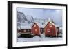 Fresh Snow Covering the Typical Norwegian Homes, the Rorbu, in the Lofoten Islands, Arctic, Norway-Roberto Moiola-Framed Photographic Print